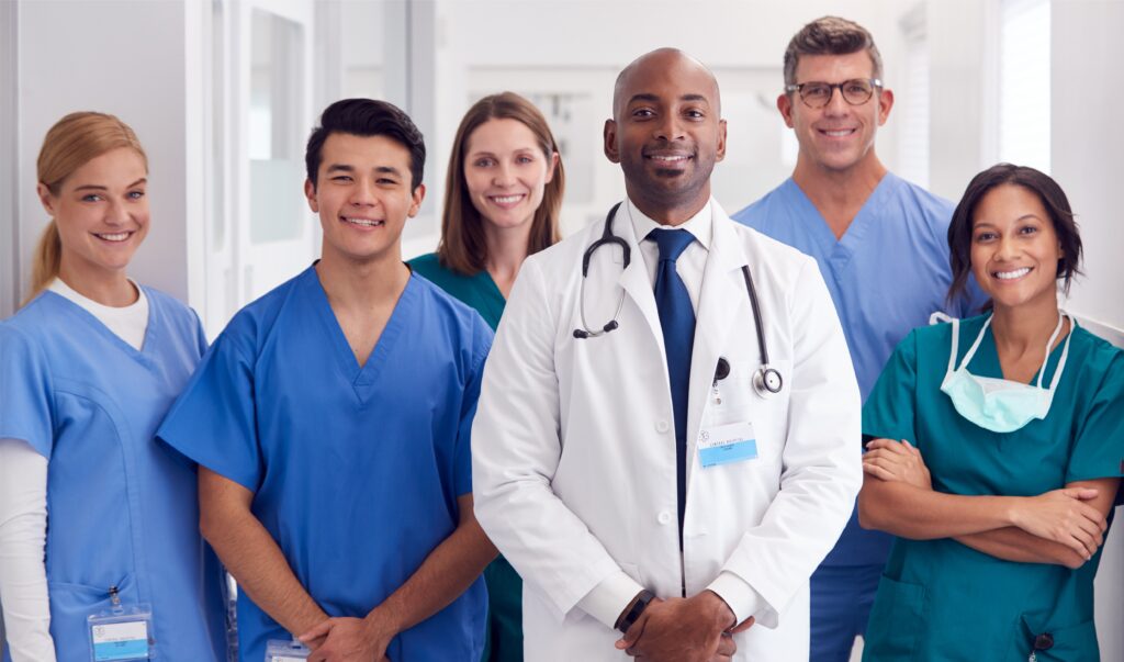 A group of doctors standing in front of each other.
